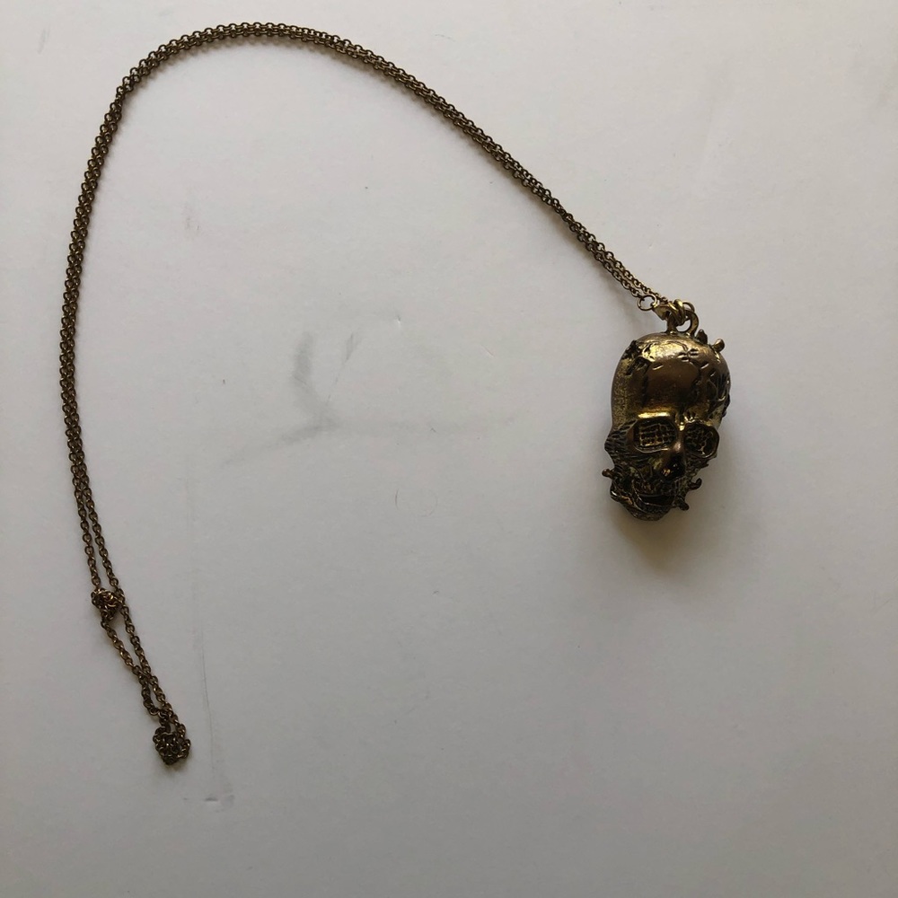 •EarthBound • gold Skull necklace
